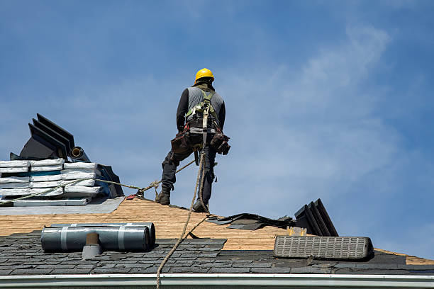 Professional Roofing technician working in McChord AFB, WA